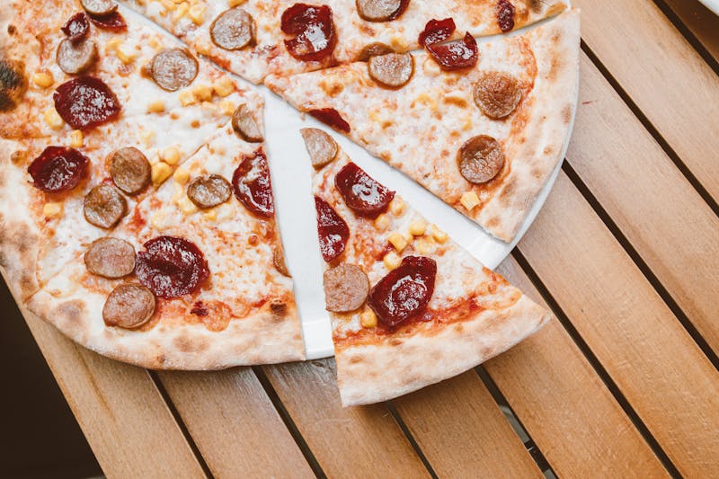 spicy Italian sausage pizza with peppers